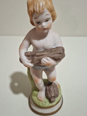 Porcelain figurine of a child vintage, like new