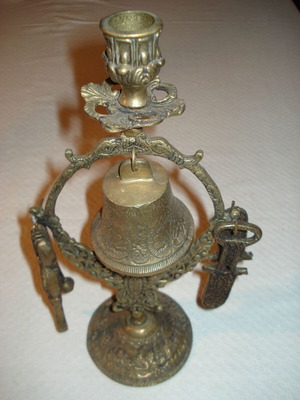 Brass candlestick with bell used