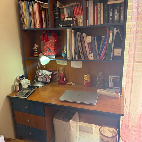 Desk with bookshelf and chair used, ideal for students or pupils