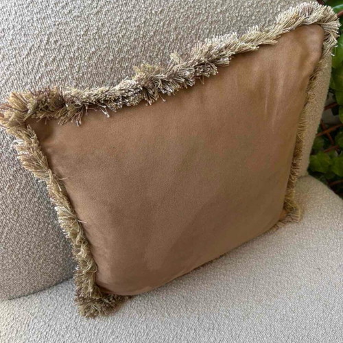 Pillow used in camel color with fringes