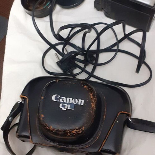 Canon Canonet QL19 camera used with flash and extra lens