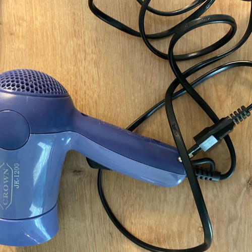 Travel hair dryer used, small, mauve color