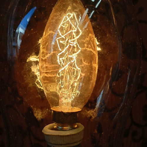 Rustic old lamp with Edison filament bulb used