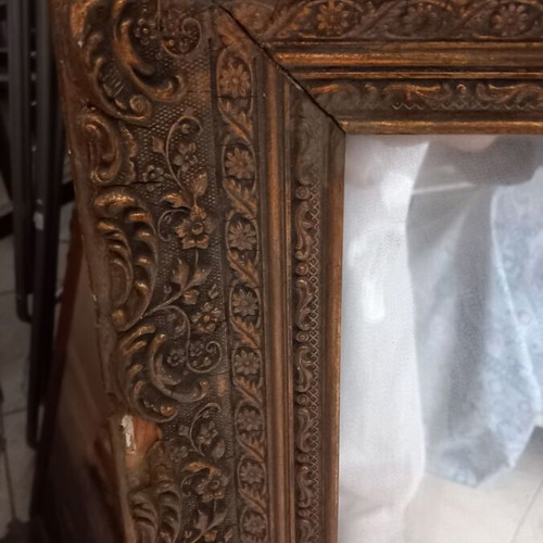 Mirror with wooden gold carved frame used, with damages
