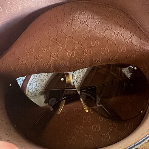 Gucci women's sunglasses used with brown lenses