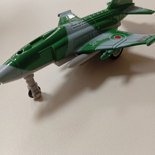 Small airplane figure toy used