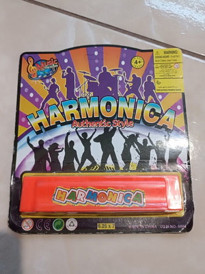 Children's harmonica orange new