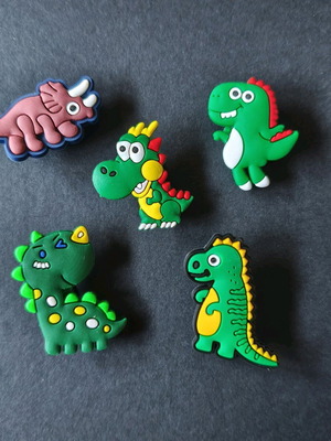 Crocs charms set with cute dinosaurs like new, multicolor