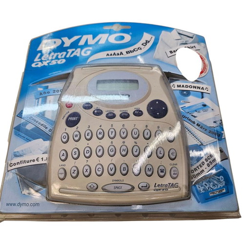 Portable label maker new with replacement tape