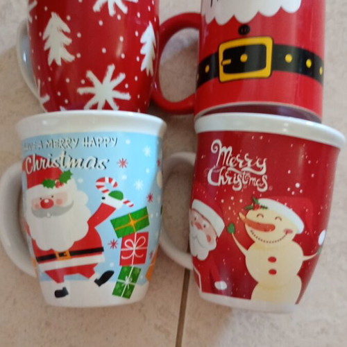 Christmas mugs set of 4 like new, 3 red and 1 blue