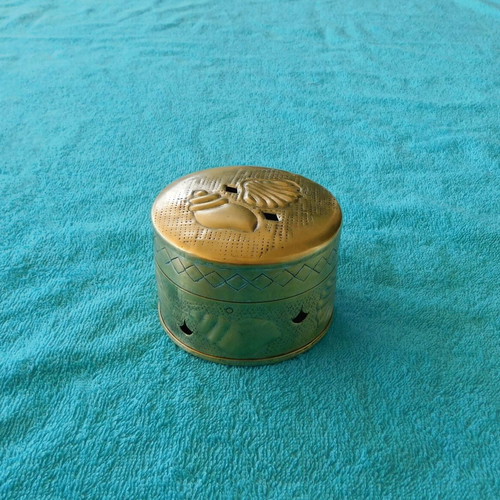 Bronze perforated box with embossed floral designs, vintage, used