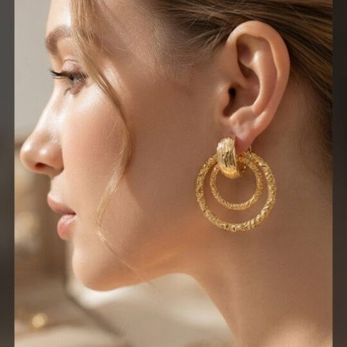 Hebe earrings in gold with zircon and hammered design like new