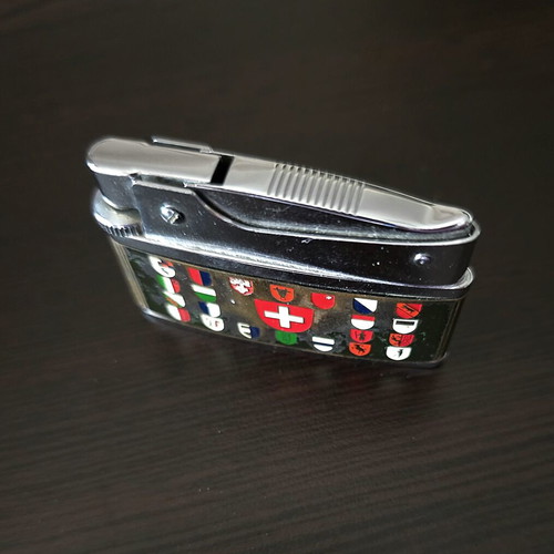 Vintage Switzerland Collectible Pocket Lighter used, fully functional