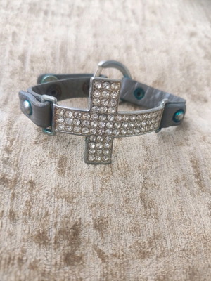 Silver cross bracelet with rhinestones and grey leather strap used