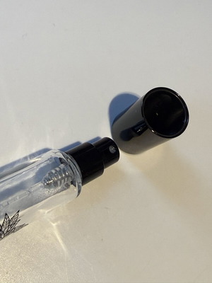 Diptique empty bottle with applicator used