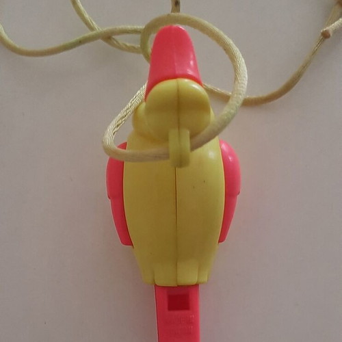 '90s Hanging Duck Whistle like new, yellow and pink