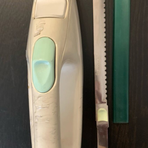 Moulinex electric knife used with worn yellow rubber