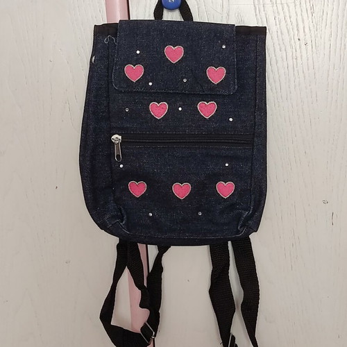 Small denim backpack with heart designs like new