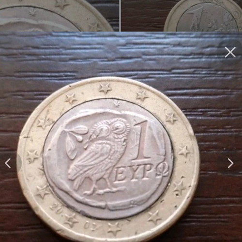 1€ coin used with two minting errors