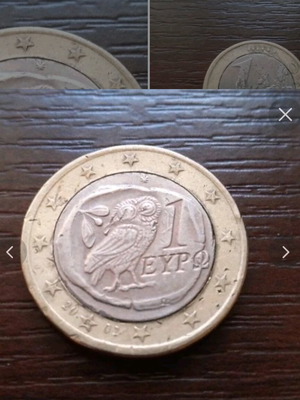 1€ coin used with two minting errors