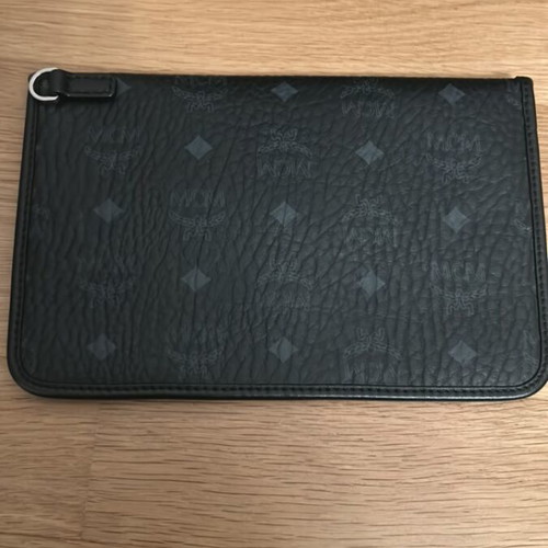 MCM collectible black crossbody bag like new with detachable pouch