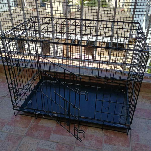 Pet crate used, size M, black with 2 doors