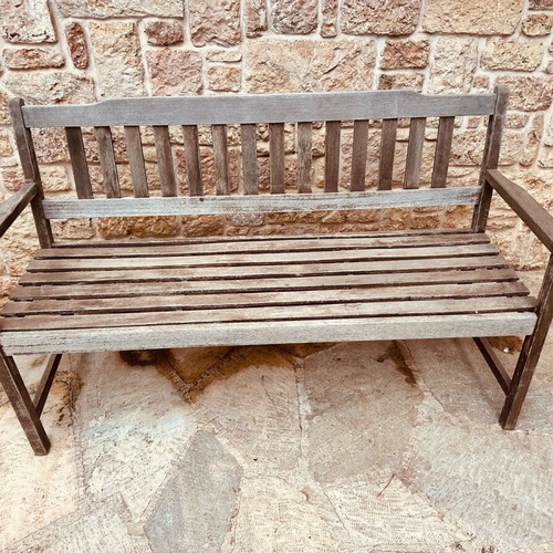 Outdoor bench used, made of solid teak wood
