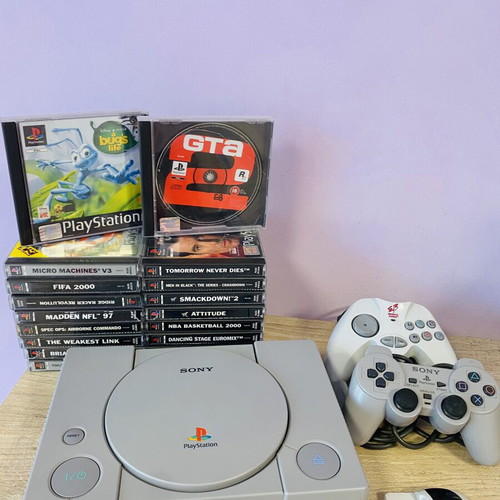 PlayStation 1 PS1 console like new with 18 original games