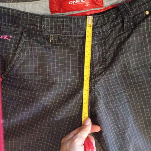 O'Neill women's shorts used, size 28, colorful checkered pattern