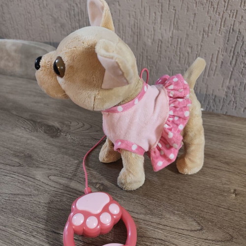 Plush dog with leash and sound used