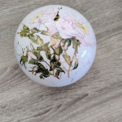 Ceramic decorative item with decoupage technique used