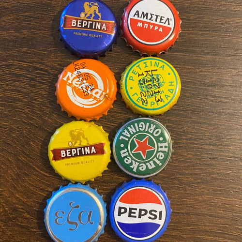 Beer and soda bottle caps used, set of 8, all Greek