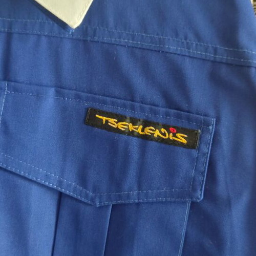Vintage Tseklenis school apron like new, Minion label