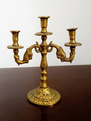 Vintage brass triple carved candlestick used