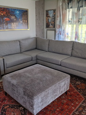 Corner sofa used with living room ottoman