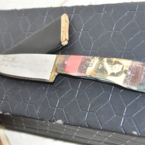 Traditional Cretan Knife with Mantinada and Decorative Handle used