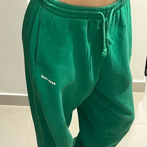 Green athletic pants like new, baggy wide fit