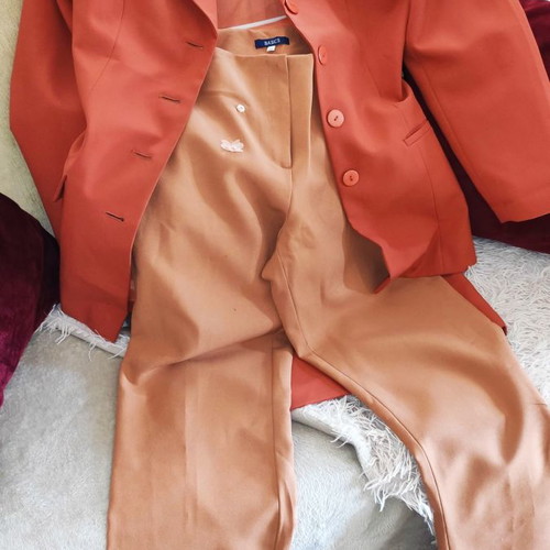 Orange suit and pants used, size 46