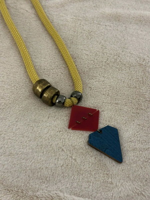 Necklace with geometric elements like new, red and yellow