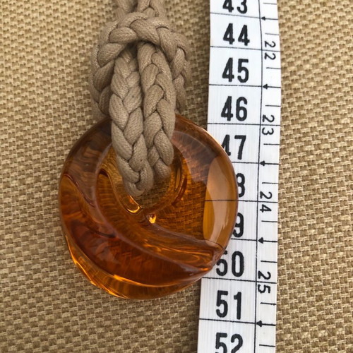 Baccarat crystal pendant like new, amber color