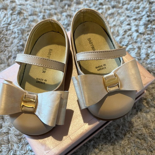 Babywalker nude color with bow, like new, size 20
