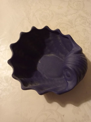 Decorative ceramic bowl with shell design used, blue