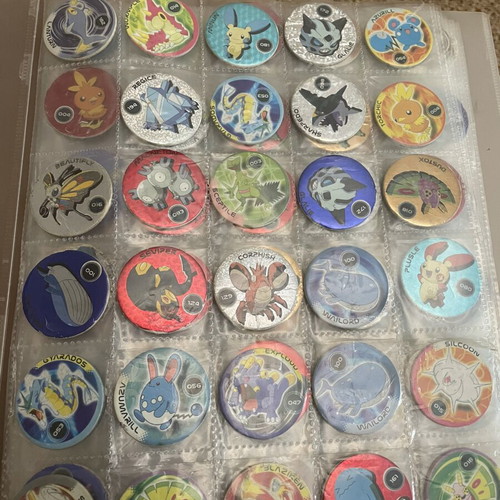Pokemon tazos with album collection