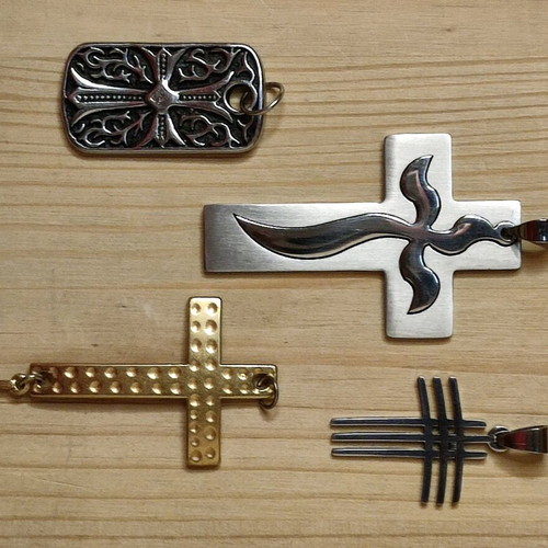 Pendant crosses like new, set of 4, gold and silver colors