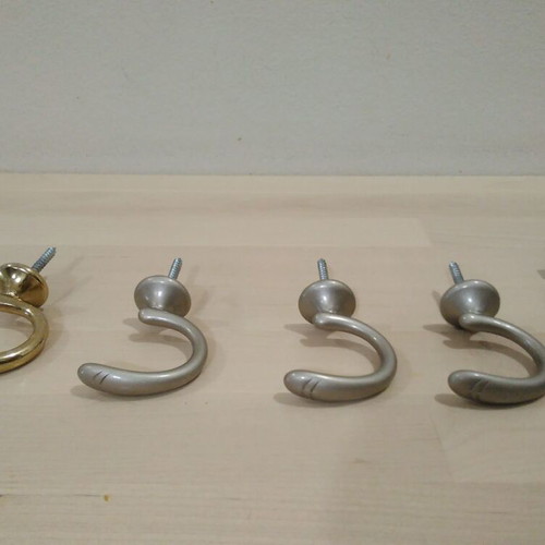 Curtain support bases set used, 8 bronze pieces, silver and gold