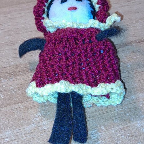 Knitted doll used, as shown