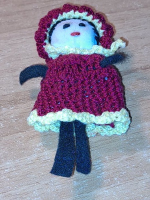 Knitted doll used, as shown