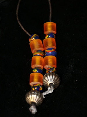 Begleri handmade with porcelain and amber by Indico Jewells