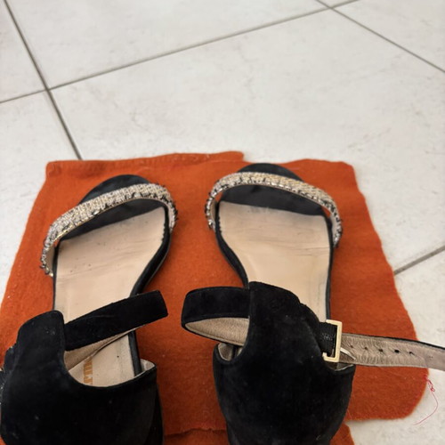 Black sandals used with braided gold details, size 38