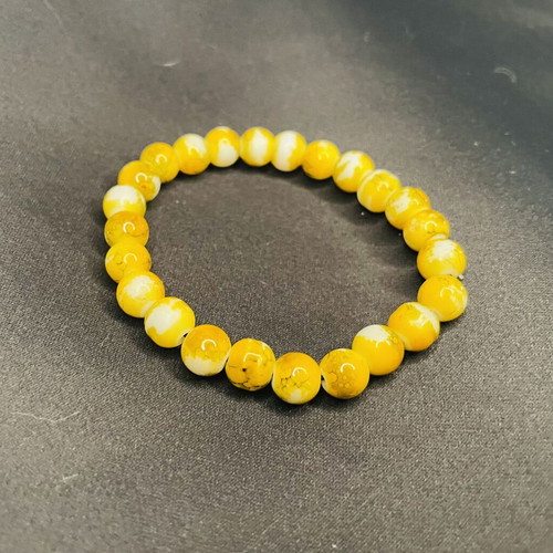 Boho handmade bracelet with yellow crackle beads